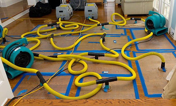 Professional Crawl Space Water Removal technician working in Oxford, KS